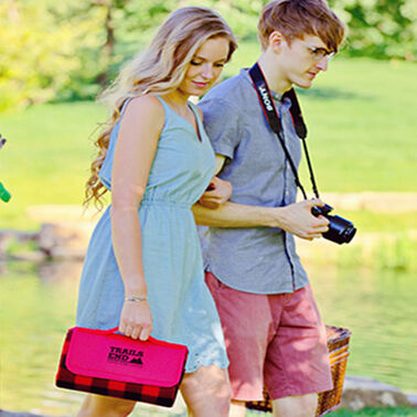 https://doieur1arw9xr.cloudfront.net/optamark/images/opt/products_gallery_images/Plaid-Barrel-Fleece-Picnic-Blanket3.jpg?v=9906